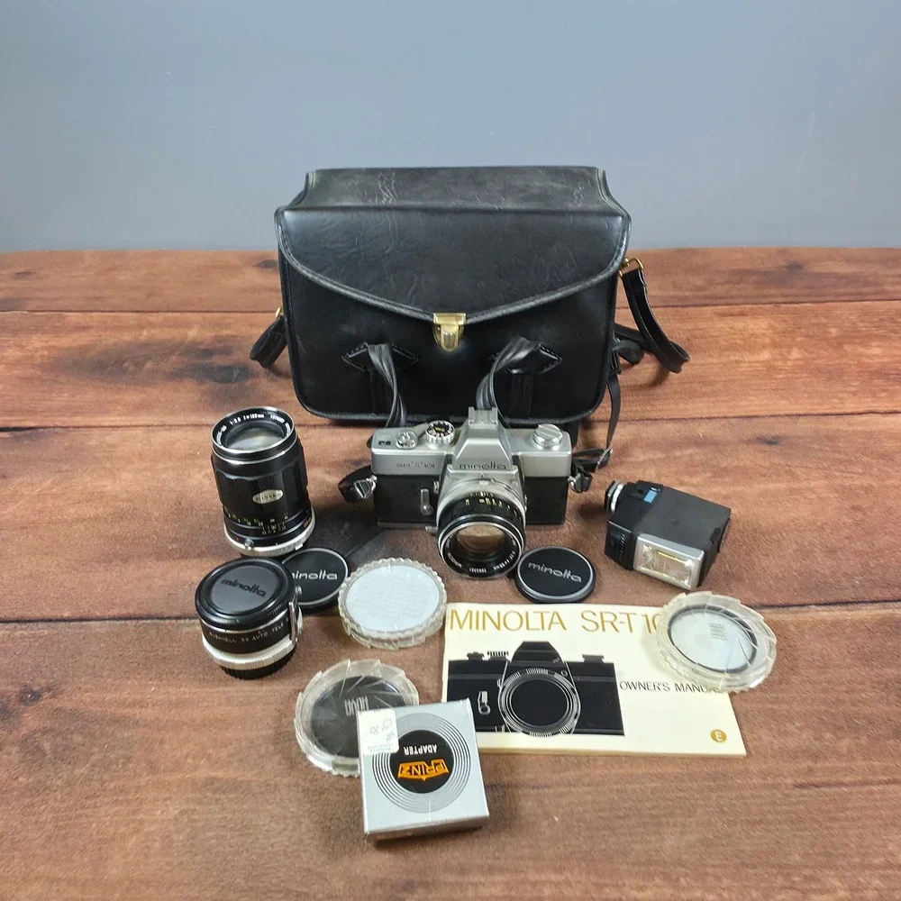 Minolta SRT 101 Film Camera Kit Silver Good 55mm 135mm Lenses Flash Case Manual